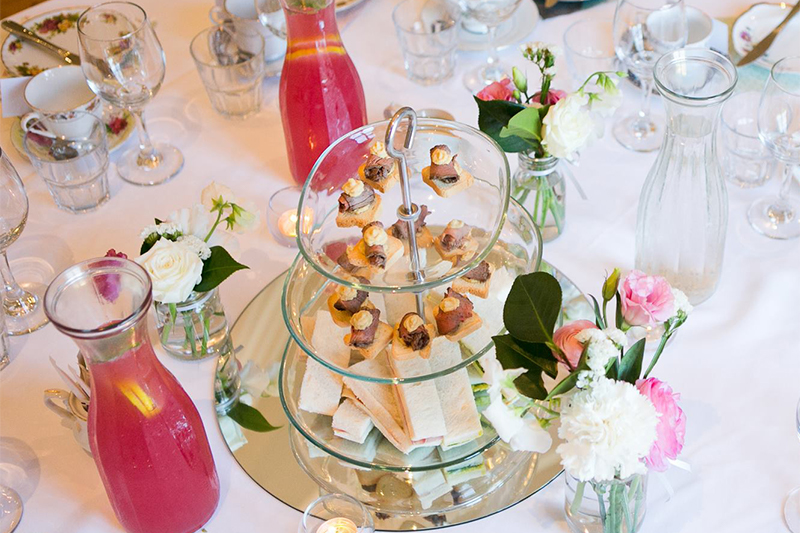 Tiered stands of high tea delicacies at Glanville Hall